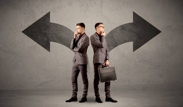 istock Businessman with two choices 1190835637