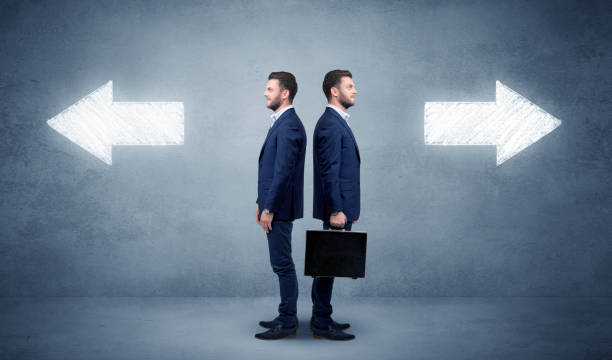 istock Businessman with two choices 1190835846