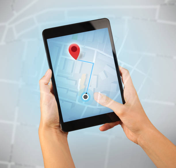 istock Female hand holding tablet 1190836824