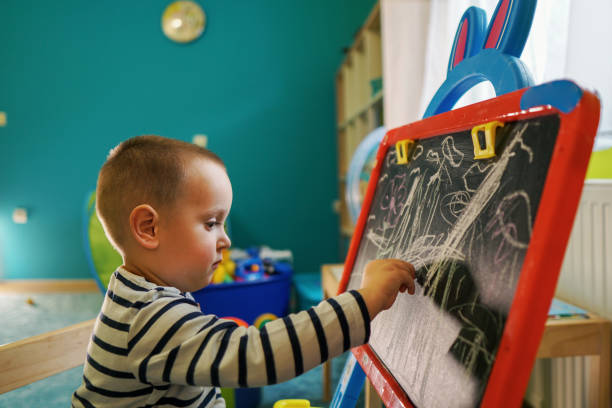 istock Little boy learning how to be an artist 1190840704
