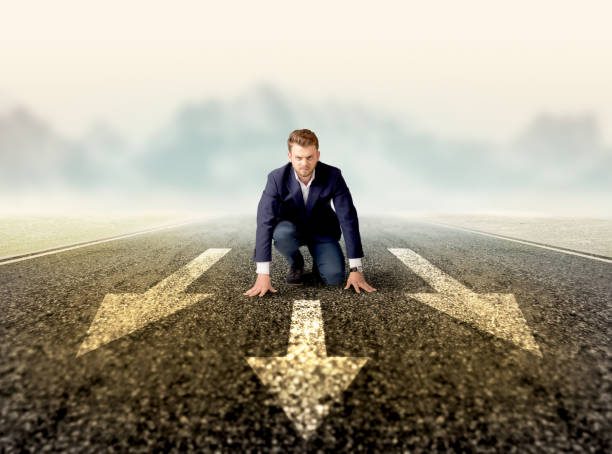 istock Businessman kneeling in ready position 1190841135