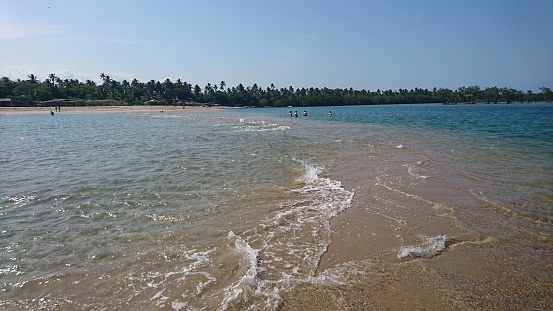 A clean part of the tropical beach facing the Indian Ocean north of Trincomalee in the Easter Province in Sri Lanka
