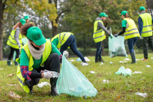 istock Volunteers collecting rubbish in park 1190841206