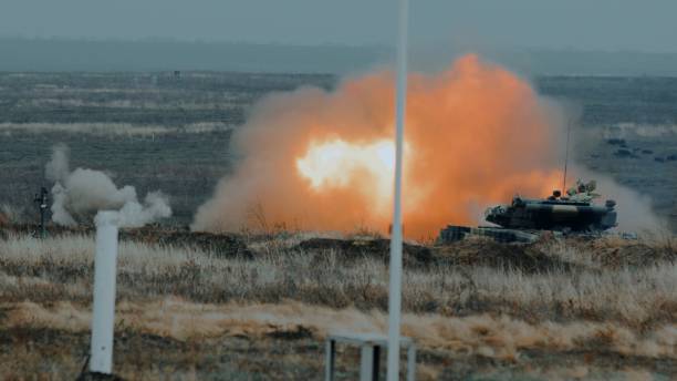 istock Artillery tank shoots in the steppe 1190841266