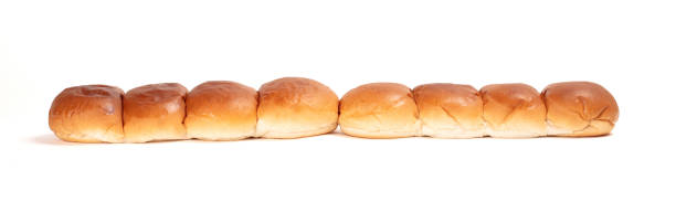 istock View of group small round bread, isolated on white 1190852343