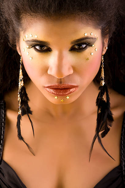 istock Young beautiful African woman with art make-up 119085670