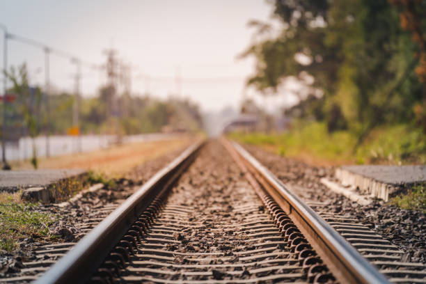 istock Photos of railway tracks with artificial sunlight 1190860253