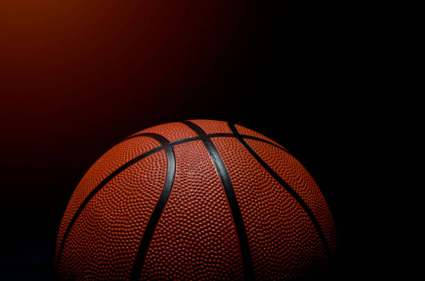 istock Basketball ball on black background. 1190861591