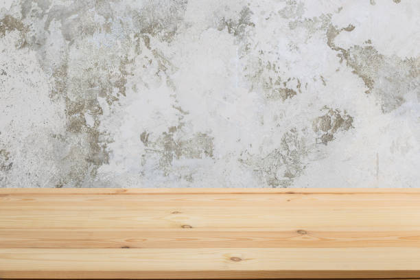 istock Wooden board empty table in front of a blurred background. Perspective brown wood with blurry grunge or old wall backdrop - can be used to showcase or mount your products. Mock up 1190866854