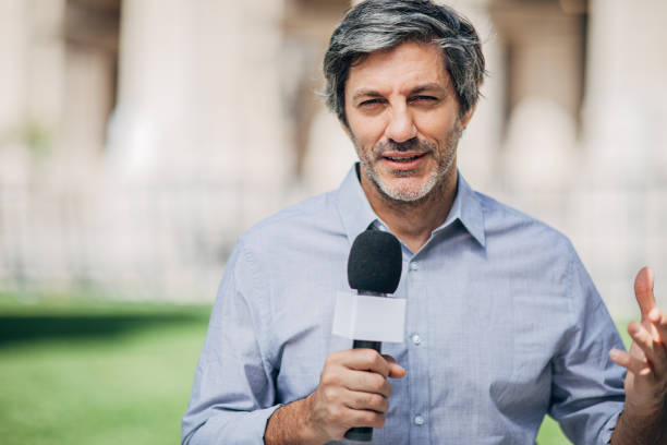 istock News reporter in live broadcasting 1190867740
