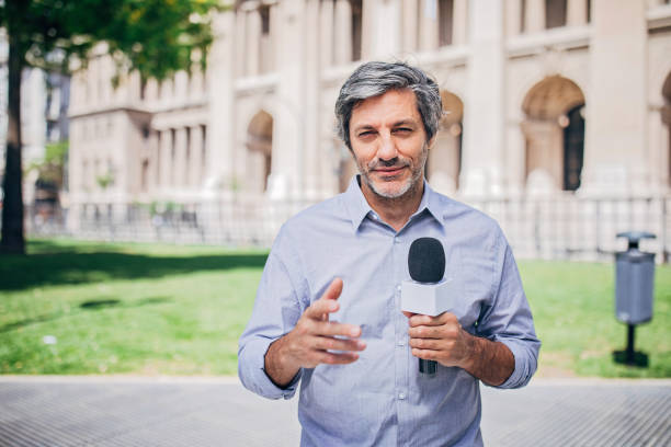 istock News reporter in live broadcasting 1190867836