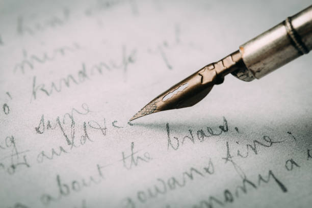 istock fountain pen on paper with ink text closeup 1190868091