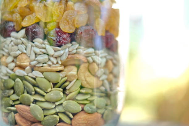 istock The mixed nuts in clear glass container. Healthy food. 1190879029