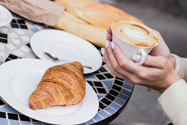 istock French breakfast concept. Coffee with croissant. 1190881055