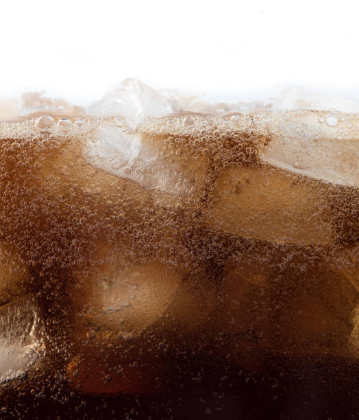 istock Cola with ice cubes close up background 1190883817