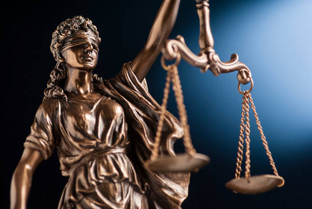 istock Bronze statue of Justice holding up scales 1190884976