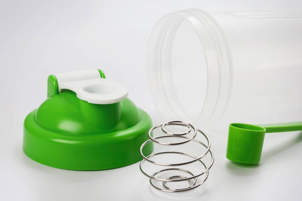 istock Green protein shaker and scoop 1190886092
