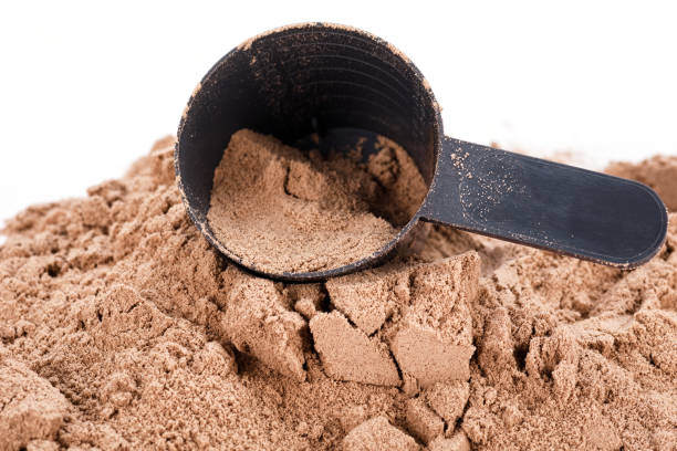 istock Scoop with a chocolate protein powder 1190886408