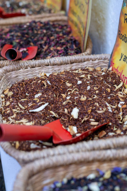 istock Assortment of herbal aromatic tea blends in tea shop 1190886619