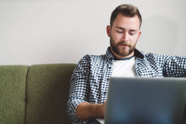 istock Caucasian man working as a freelancer from home 1190886767