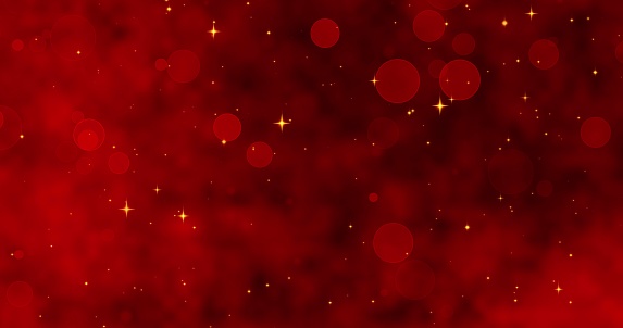 Red confetti, snowflakes and bokeh lights on the red Christmas background.