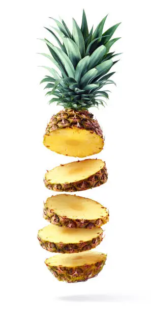 Photo of Flying fresh ripe pineapple slices