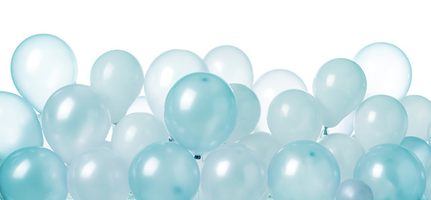 Grey and turquoise balloons isolated on a white background.