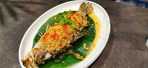 Thai food aesthetic deep​ fried​garlic Fish​ grouper​ for  the Restaurant In Bangkok Thailand