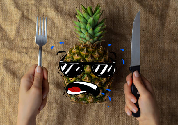 healthy pineapple fruit on a flat background top view. Fun cartoon case with pineapple.