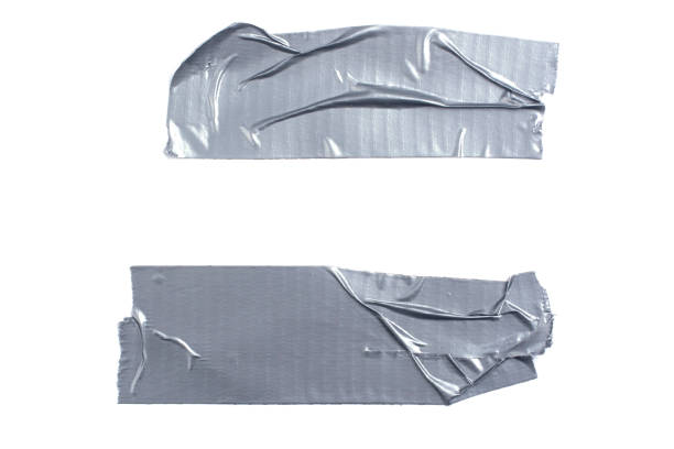 istock Two strips of silver adhesive tape isolated on a white background. 1190893337
