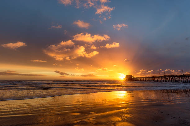 istock Newport Beach Pier - Sun Rays With Sunburst 1190901040