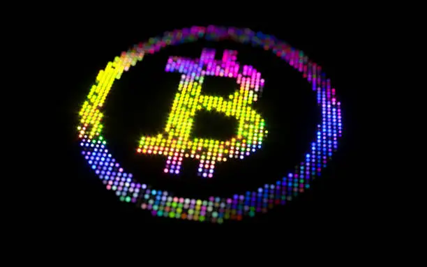 Photo of glowing bitcoin symbol on black background - 3D rendering
