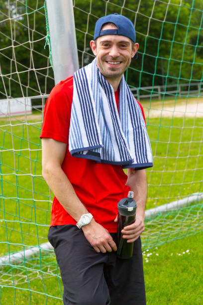 istock Sportsman with Towel and Bottle 1190904295