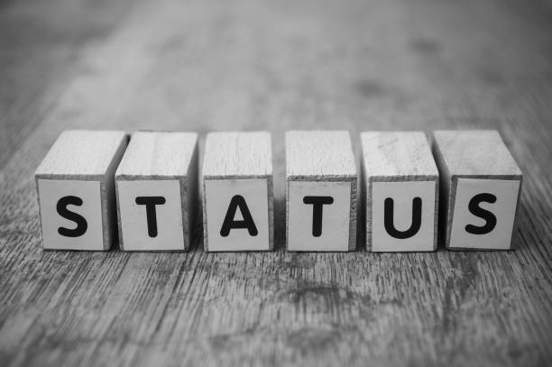 istock wooden word on wooden table background concept  - Status 1190907017