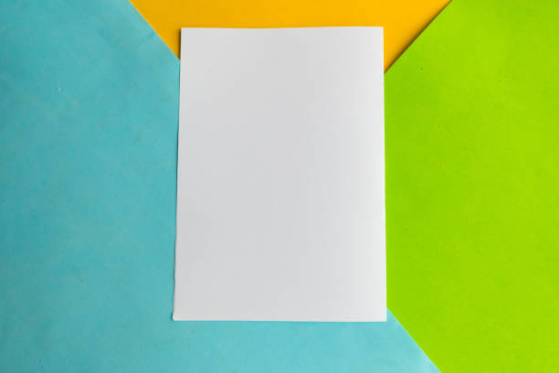 istock White mockup blank on geometric blue, green and yellow background 1190916579