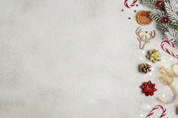 istock Christmas composition flat lay, fir tree, gingerbread, cookie cutter, candy cane, dried orange, ornaments 1190917820