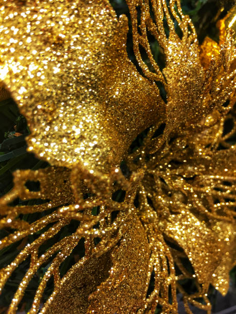 istock Gold  decoration on a Christmas tree 1190926099