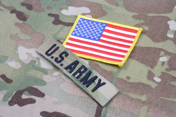 istock US ARMY branch tape with flag patch on camouflage uniform 1190926206