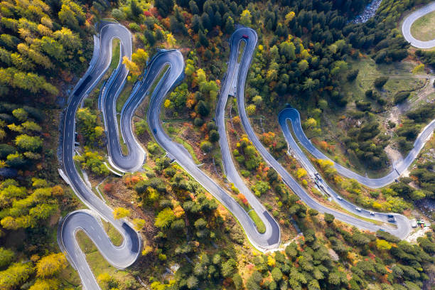 Spectacular Hairpin Road, Swiss Alps, Aerial Top View Aerial top view of Maloja Pass in autumn, Graubunden Canton, Switzerland. maloja region stock pictures, royalty-free photos & images
