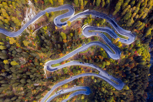 Spectacular Hairpin Road, Swiss Alps, Aerial Top View Aerial top view of Maloja Pass in autumn, Graubunden Canton, Switzerland. maloja region stock pictures, royalty-free photos & images