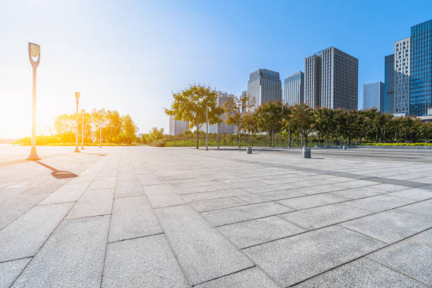 istock modern buildings and empty pavement in Tianjin, china 1190938073