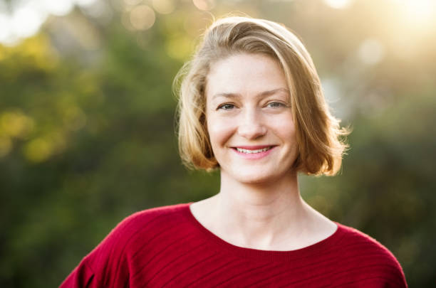 istock Happy woman feeling relaxed outdoor 1190942567
