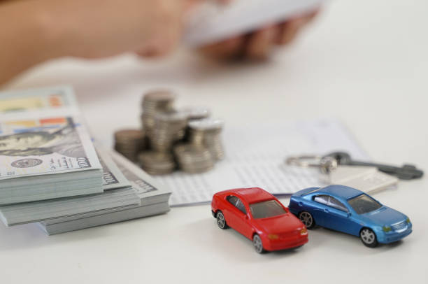 istock Sales manager giving advice application form document, considering mortgage loan offer for car and house insurance 1190944481