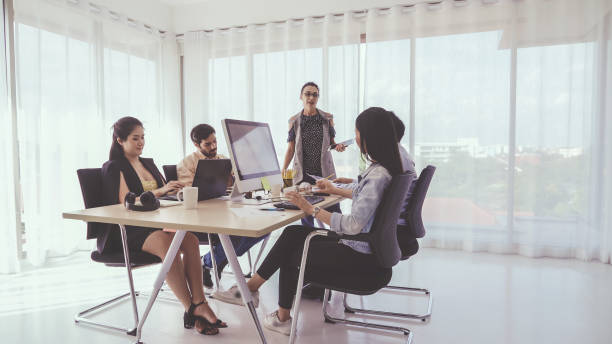 istock Senior leader giving advice speech to team members 1190948321