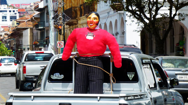 Cuenca, Ecuador - December 31, 2018; New Year Eve in Cuenca. Traditional Monigote, Mannequin or stuffed dummy on the vehicle. According to tradition monigote will get burned at midnight