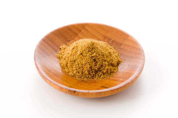 istock Cumin Powder in wooden Small dish on White Background 1190953295