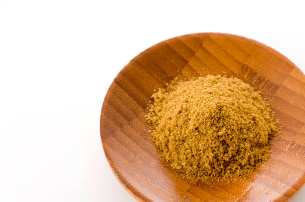 istock Cumin Powder in wooden Small dish on White Background 1190953513