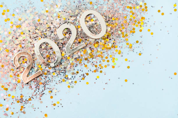istock Silver and golden Christmas decorations on pastel blue background. 1190965222
