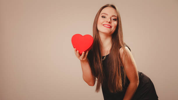 istock Happy girl with heart 1190976505