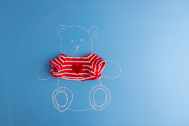 Drawing of teddy bear on blue background